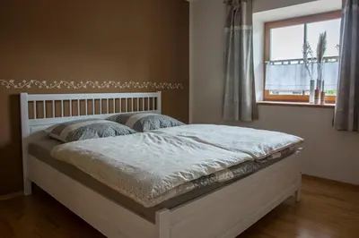 Ein Bett oder Betten in einem Zimmer der Unterkunft Bio-Bauernhof Eisele