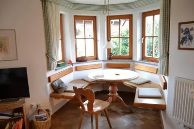 Ein Sitzbereich in der Unterkunft Ferienwohnung Am Anger