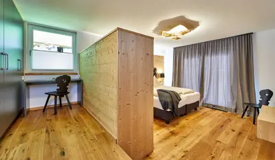 Ein Bett oder Betten in einem Zimmer der Unterkunft Parkresidenz