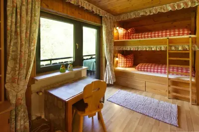 Ein Bett oder Betten in einem Zimmer der Unterkunft Wettersteinpanorama - a74054