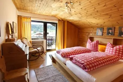 Ein Bett oder Betten in einem Zimmer der Unterkunft Wettersteinpanorama - a74054