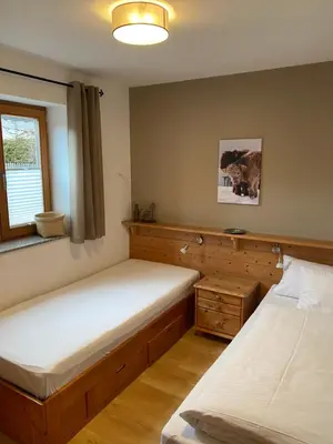 Ein Bett oder Betten in einem Zimmer der Unterkunft Ferienwohnung Martina Bauer