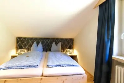 Ein Bett oder Betten in einem Zimmer der Unterkunft BergZeit - a74009