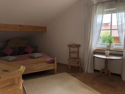 Ein Bett oder Betten in einem Zimmer der Unterkunft Ferienwohnung / Appartement Bergliebe