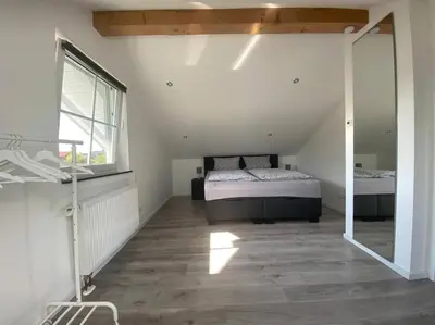 Ein Bett oder Betten in einem Zimmer der Unterkunft Ferienwohnung im Allgäu