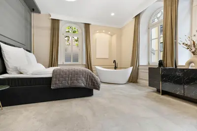 Ein Bett oder Betten in einem Zimmer der Unterkunft BOUTIQUE ROOMS I Luxus Suite I Center I Boxspring