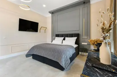 Ein Bett oder Betten in einem Zimmer der Unterkunft NEW I LUXUS Suite I Kingbed I Center