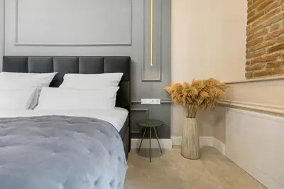 Ein Bett oder Betten in einem Zimmer der Unterkunft NEW I LUXUS Suite I Kingbed I Center