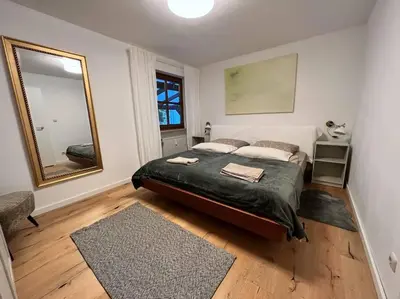 Ein Bett oder Betten in einem Zimmer der Unterkunft Garten-Ferienwohnung Seppi