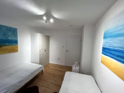 Ein Bett oder Betten in einem Zimmer der Unterkunft Garten-Ferienwohnung Seppi