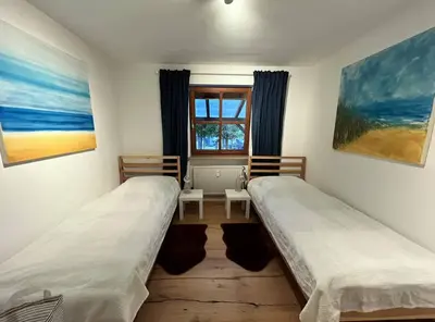 Ein Bett oder Betten in einem Zimmer der Unterkunft Garten-Ferienwohnung Seppi
