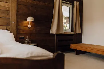 Ein Bett oder Betten in einem Zimmer der Unterkunft Wallerei Walchensee