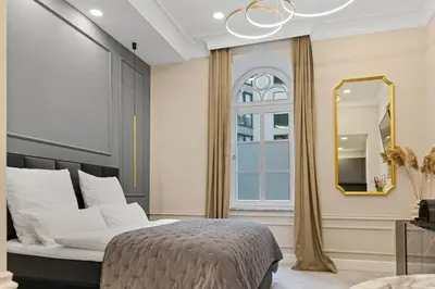 Ein Bett oder Betten in einem Zimmer der Unterkunft DESIGN Studio I Center I Kingbed I NEW