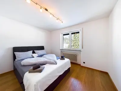 Ein Bett oder Betten in einem Zimmer der Unterkunft Schnitzerstube