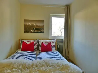 Ein Bett oder Betten in einem Zimmer der Unterkunft Ferienwohnung Alpenglück