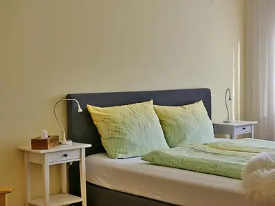 Ein Bett oder Betten in einem Zimmer der Unterkunft Ferienwohnung Alpenglück