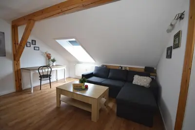 Ein Sitzbereich in der Unterkunft Bimax Neu renovierte, gemütl. 4 Zimmer Dachwohnung