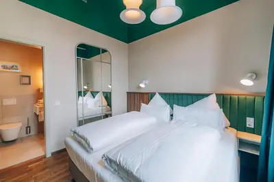 Ein Bett oder Betten in einem Zimmer der Unterkunft Hotel Amalia - Boutique Hotel