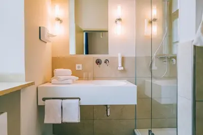 Ein Badezimmer in der Unterkunft Hotel Amalia - Boutique Hotel