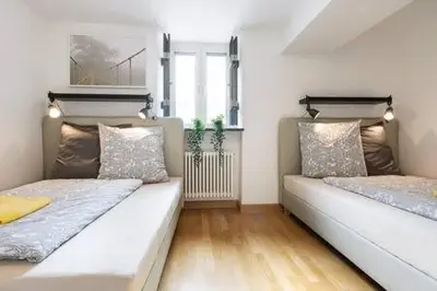 Ein Bett oder Betten in einem Zimmer der Unterkunft MARIENPLATZ Apartment 2 bedrooms living room kitchen