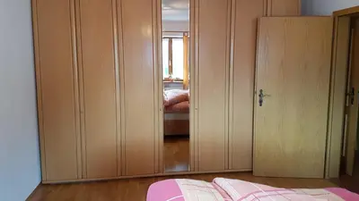 Ein Bett oder Betten in einem Zimmer der Unterkunft Ferienwohnung Moosegger