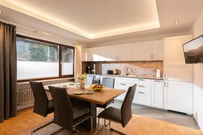 Küche/Küchenzeile in der Unterkunft Ferienhaus Wildbarren - Alpenmagie Suites