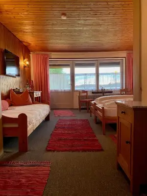 Ein Bett oder Betten in einem Zimmer der Unterkunft Lago mio - Pension am See - bei uns verbringt Ihr eine wundervolle Zeit direkt am Wasser