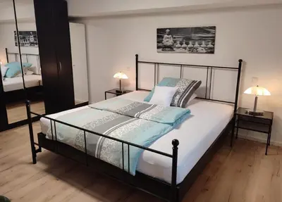 Ein Bett oder Betten in einem Zimmer der Unterkunft Gästewohnung Mühlstein