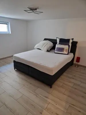 Ein Bett oder Betten in einem Zimmer der Unterkunft E&O
