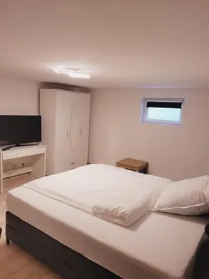 Ein Bett oder Betten in einem Zimmer der Unterkunft E&O