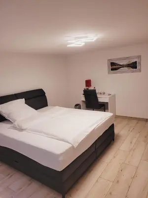 Ein Bett oder Betten in einem Zimmer der Unterkunft E&O