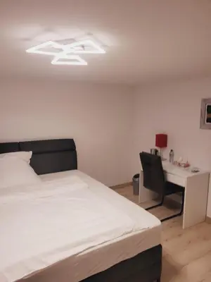 Ein Bett oder Betten in einem Zimmer der Unterkunft E&O