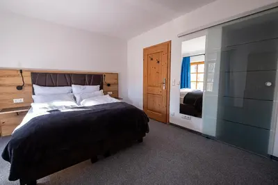 Ein Bett oder Betten in einem Zimmer der Unterkunft SL Hotel