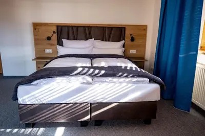 Ein Bett oder Betten in einem Zimmer der Unterkunft SL Hotel