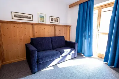 Ein Sitzbereich in der Unterkunft SL Hotel