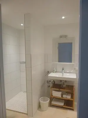 Ein Badezimmer in der Unterkunft Ferienwohnung Gutshof in Seenähe