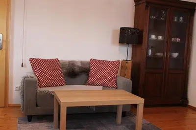 Ein Sitzbereich in der Unterkunft Holzer-Hof