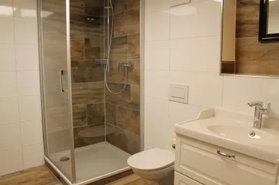 Ein Badezimmer in der Unterkunft Holzer-Hof