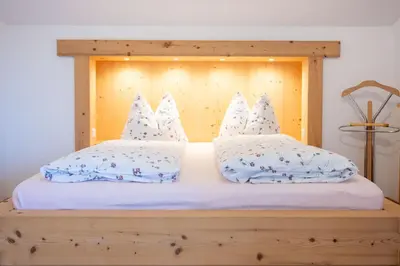 Ein Bett oder Betten in einem Zimmer der Unterkunft Gästehaus Kleinbuch