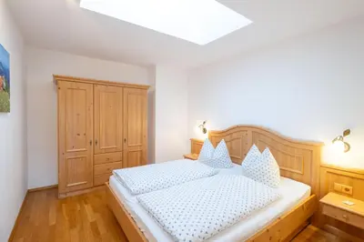Ein Bett oder Betten in einem Zimmer der Unterkunft Gästehaus Kleinbuch
