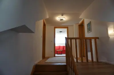 Ein Bett oder Betten in einem Zimmer der Unterkunft Ferienwohnung Jenbachtal