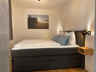 Ein Bett oder Betten in einem Zimmer der Unterkunft Ferienwohnung Einklang