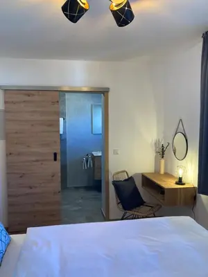 Ein Bett oder Betten in einem Zimmer der Unterkunft Ferienwohnung Einklang
