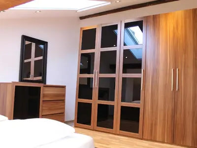 Ein Bett oder Betten in einem Zimmer der Unterkunft Ferienwohnung Kohlstatt