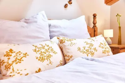 Ein Bett oder Betten in einem Zimmer der Unterkunft Übersee21 Ferienloft am Chiemsee