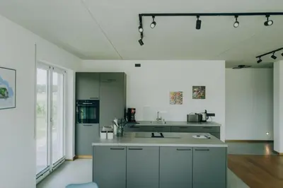 Küche/Küchenzeile in der Unterkunft Neubau Grüner Wolpertinger Designwhg 106qm Barrierefrei
