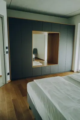 Ein Bett oder Betten in einem Zimmer der Unterkunft Neubau Grüner Wolpertinger Designwhg 106qm Barrierefrei