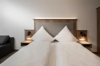 Ein Bett oder Betten in einem Zimmer der Unterkunft Landgasthof Maier