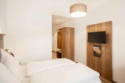 Ein Bett oder Betten in einem Zimmer der Unterkunft Landgasthof Maier