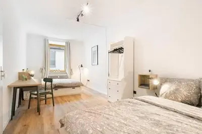Ein Bett oder Betten in einem Zimmer der Unterkunft Grand Apartment close to the Isar and Citycenter